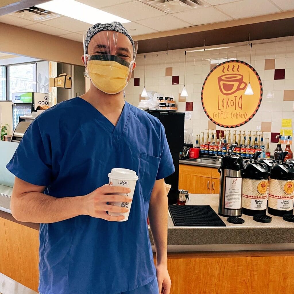 Doctor Holding Coffee